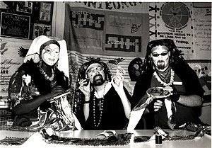 Three members of the Sisters of Perpetual Indulgence, working on a memorial quilt