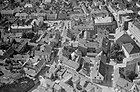 Deler av Tønsberg sentrum 1949 med Torvet øverst i bildet. Foto: Widerøe/Vestfoldmuseene