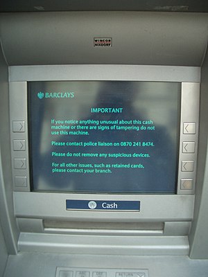 Tamper warning on ATM in London. Wincor-Nixdor...