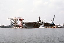 America in Norfolk Naval Shipyard 1987. USS America (CV-66) Norfolk Naval Shipyard.jpg