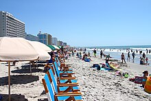 Hotels and tourists along the Atlantic Ocean shoreline in Myrtle Beach, South Carolina in summer Atlantic Ocean shoreline in Myrtle Beach, South Carolina.jpg