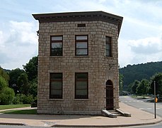 A stone bank with front corners cut at forty-five degree angles