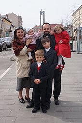 Married Romanian Eastern Catholic priest from Romania with his family Catholic priest with his Family.jpg