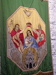 Replica of a Confederation flag found in Rothe House, Kilkenny; it depicts the Coronation of Mary as Queen of Heaven by the Holy Trinity; an explicitly Catholic symbol. Confederate Ireland flag, Kilkenny.jpg