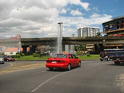 Fuente de la Hispanidad and Mall San Pedro (right)