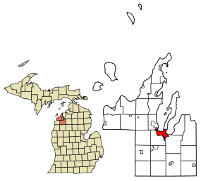 Location of Traverse City within Grand Traverse County and Leelanau County