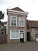 Winkel met woning