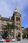 This imposing building, which is reminiscent of a Rhine-land Castle, was designed in 1897 by H. S. Greaves of the Public Works Department of the Cape Colonial Government. It was erected by J Kholer and Sons. Although only fully completed in 1902, the bui Architectural style: H. S. Greaves. Type of site: Post Office. This imposing building, which is reminiscent of a Rhineland Castle, was designed in 1897 by H S Greaves of the Public Works Department of the Cape Colonial Government. It was erected by J Kohler & Sons. Although only fully completed in 1902, the building