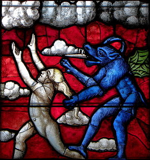 Part of stained glass in the Chapelle Notre-Dame de Kergoat. An angel is chased by a demon.