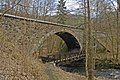 Eisenbahnbrücke über die Sebnitz (Bogenbrücke aus Granitmauerwerk und Sandsteinquadergewölbe) mit Stützmauern (Einzeldenkmal zu ID-Nr. 09302086)