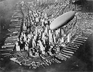 USS Akron (ZRS-4) flying over the southern end of Manhattan.