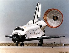 A drag chute is deployed by Endeavour as it completes a mission of almost 17 days in space on Runway 22 at Edwards Air Force Base in southern California. Landing occurred at 1:46 pm (EST), March 18, 1995. 950318 STS67 Endeavour landing.jpg