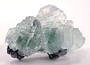 Pastel green fluorite crystal on galena