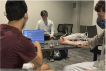 The GT Medical robotics team working on their prosthetic arm prototype.