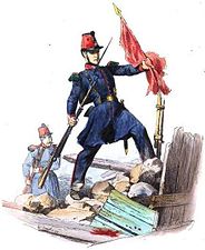 A French soldier takes down a red flag from the barricades during the Paris uprising of 1848.