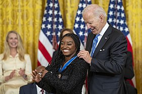President Joe Biden presenting the Medal to Simone Biles, 2022