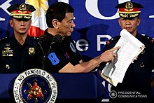 President Duterte showing list of Drug Syndicates in Butuan City in October 2016 President Rodrigo Duterte in Butuan City 1.jpg