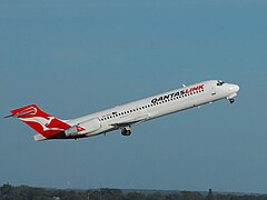 A Boeing 717-200 in the former livery