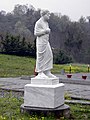 Modern statue of Aristotle near the School
