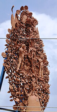 large outdoor sculpture of tree of life in Metepec