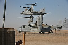 Two U.S. Marine Corps MV-22s of VMM-161 land at a forward operating base in Afghanistan, 2012 USMC V-22 241212 Afghanistan.jpg