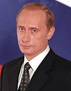 Prime Minister Vladimir Putin became acting president after the resignation of Boris Yeltsin. Vladimir Putin official portrait (1) (cropped).jpg