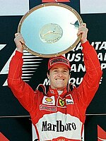 Irvine celebrating his first F1 win at the 1999 Australian Grand Prix