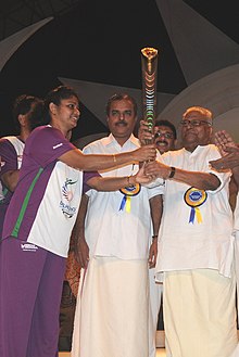 K.M Beenamol hands over the Queen's Baton to the Chief Minister of Kerala - 2010 (cropped).jpg