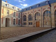 the riding school of the court, in the back, the Grande Écurie