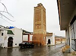 A mosque with a minaret made in brick