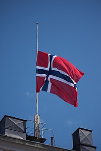 Norwegian flag at half-staff to mourn the victims of the 2011 Norway attacks Norsk flagg pa Egertorget - Norwegian flag Egertorget.jpg