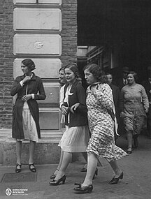 A group of working women leaving the factory in Buenos Aires, 1933.