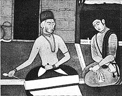 Lukisan Santo Kabir (kiri) dengan seorang murid (kanan) \