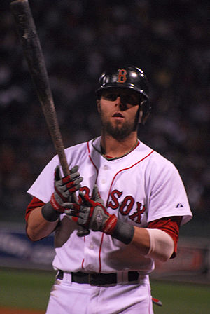Dustin Pedroia of the Boston Red Sox on deck i...