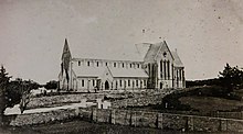 Trinity Church in 1879, the chapel-of-ease in the City of Hamilton, Bermuda, for the then-Bishop of Newfoundland and Bermuda (the Cathedral of St. John the Baptist was at St. John's, Newfoundland). Trinity Church chapel-of-ease in City of Hamilton, Bermuda 1879.jpg