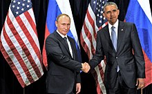 Photo of Obizzay bobbin handz wit Vladimir Putin up in front of Russian n' Gangsta flags