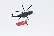Una Z-8L con la bandiera del Partito Comunista Cinese
