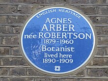 blue circular plaque reading "Agnes Arber née Robertson 1879-1960 lived here 1890-1909." At the top it reads "English Heritage"