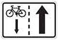 E 12 Jízda cyklistů v protisměru (dodatková tabulka „Text“ se přečíslovává na E 13)