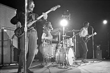CCR in concert in Inglewood, California, December 1969 Creedence Clearwater Revival performing on stage at the Forum.jpg