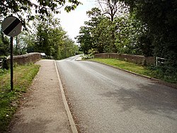 Cropredy Bridge, looking east towards Williamscot. On the fence beyond the left-hand parapet may be seen a plaque commemorating the battle. Cropredy Bridge, towards Williamscot - geograph.org.uk - 435029.jpg