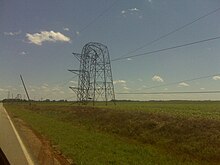 Transmission tower bent near Huntsville, Alabama. Electric line tower.jpg