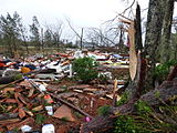 EF4 damage: Brick home reduced to piles of rubble. Above-ground structures are almost completely vulnerable to EF4 tornadoes, which level well-built structures, toss heavy vehicles through the air, and uproot trees, turning them into flying missiles. Around 1.1% of annual tornadoes in the U.S. are rated EF4.