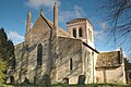 West view of church showing Early English lancet windows and tall 16th century pinnacles