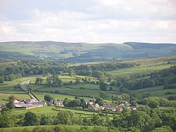 Llandegley in 2008, seen from The Pales, with the moors of the southern Radnor Forest in the background;