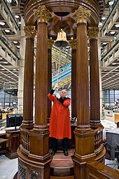 The Lutine bell, housed in the rostrum in the main Underwriting Room Lloyd's building Lutine Bell.jpg