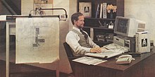 A man using AutoCAD 2.6 to digitize a drawing of a school building. Man using AutoCAD (1987).jpg