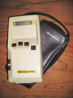 The Microwriter MW4 (circa 1980) uses a chording keyboard in which several key presses are needed for each letter.