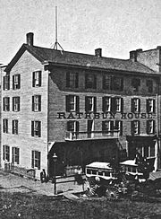 The large framed building constructed by Campau in 1834, seen in this image converted into part of the Rathbun House. Rathbun House 1870.jpg