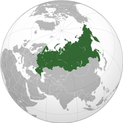 Russia on the globe, with disputed territory shown in light green.[a]